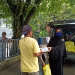 Berbagi Nasi Kotak untuk Sopir Angkot, Ojol dan Pedagang Kecil