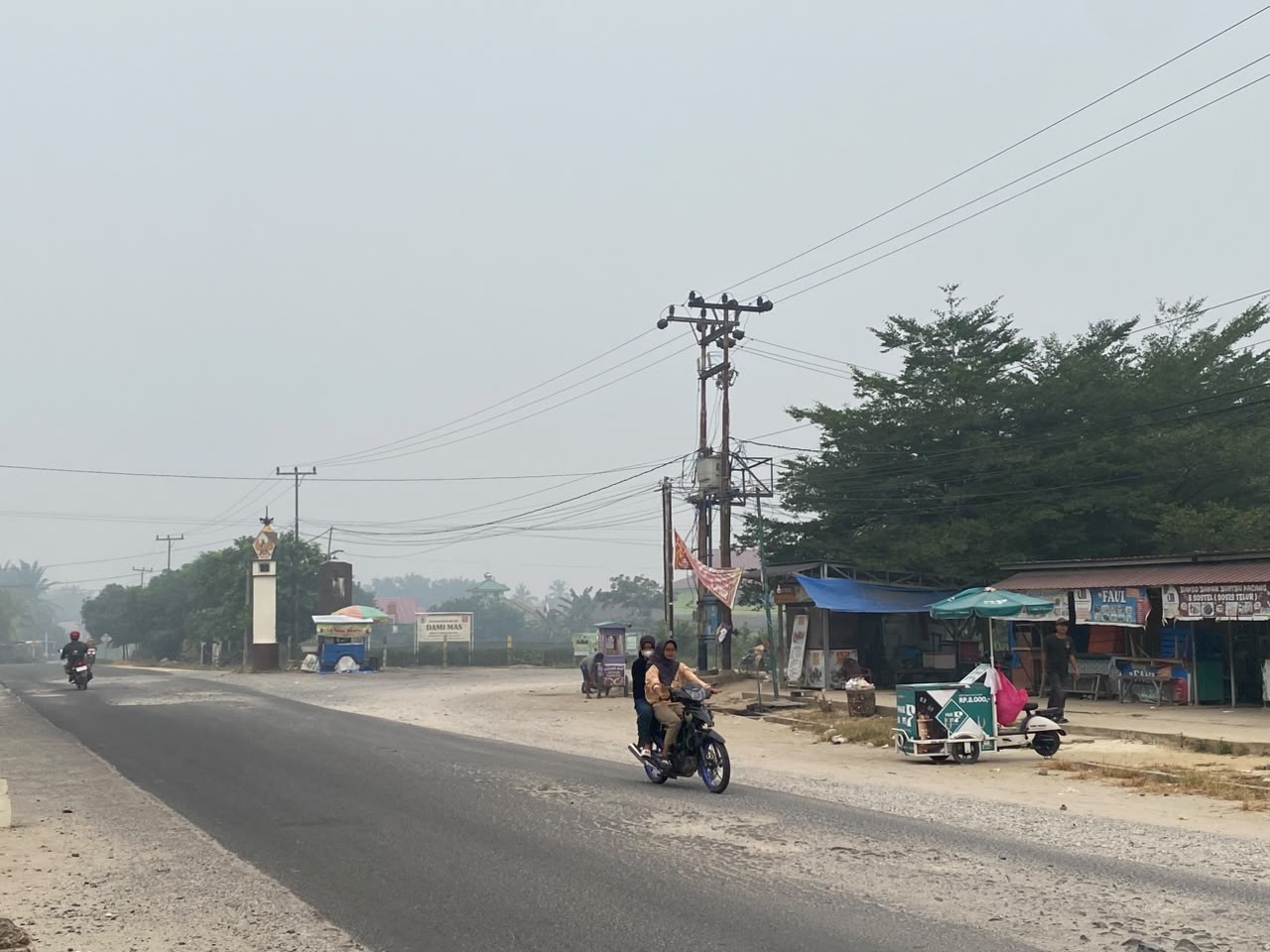 Kabut Asap Jadi Ancaman, KKN UMRI dan Pemdes Buluh Rampai Gaungkan Gerakan Pakai Masker